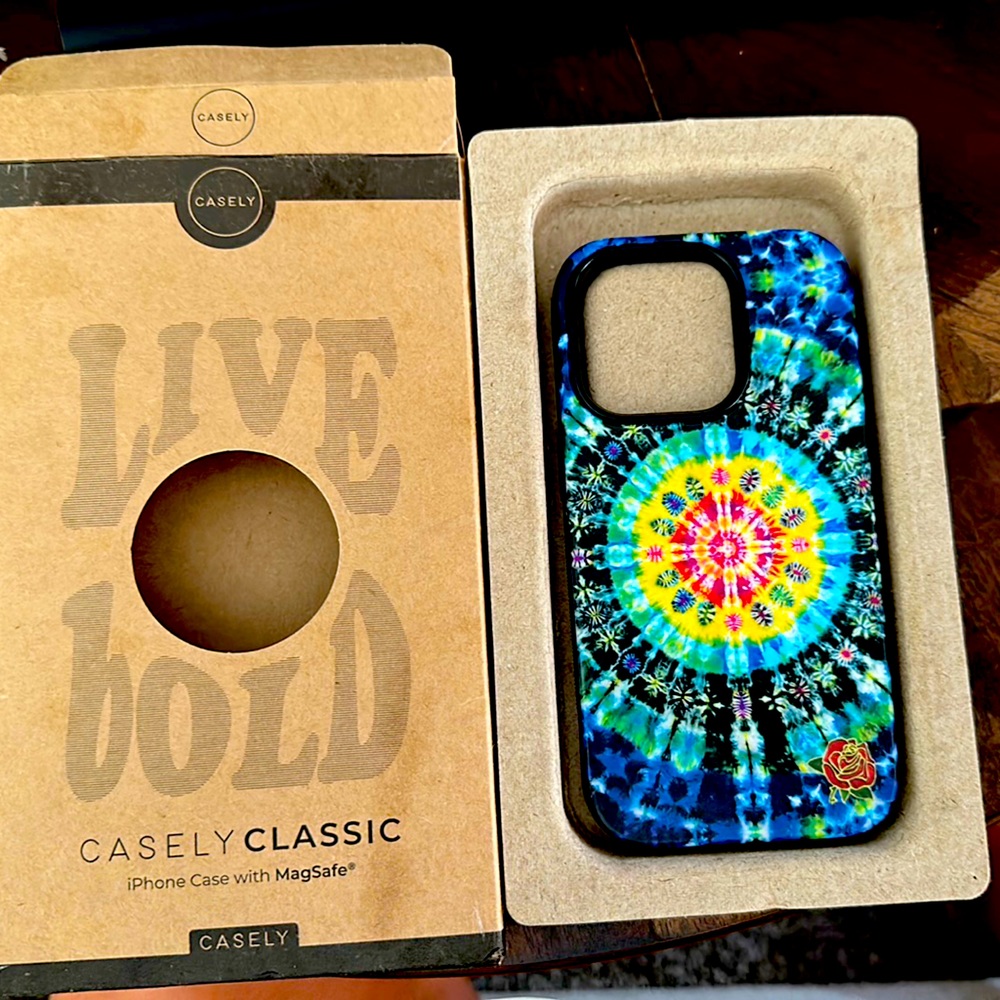 Brand new, in box. Casely Grateful Dead phone case for iPhone 14 Pro